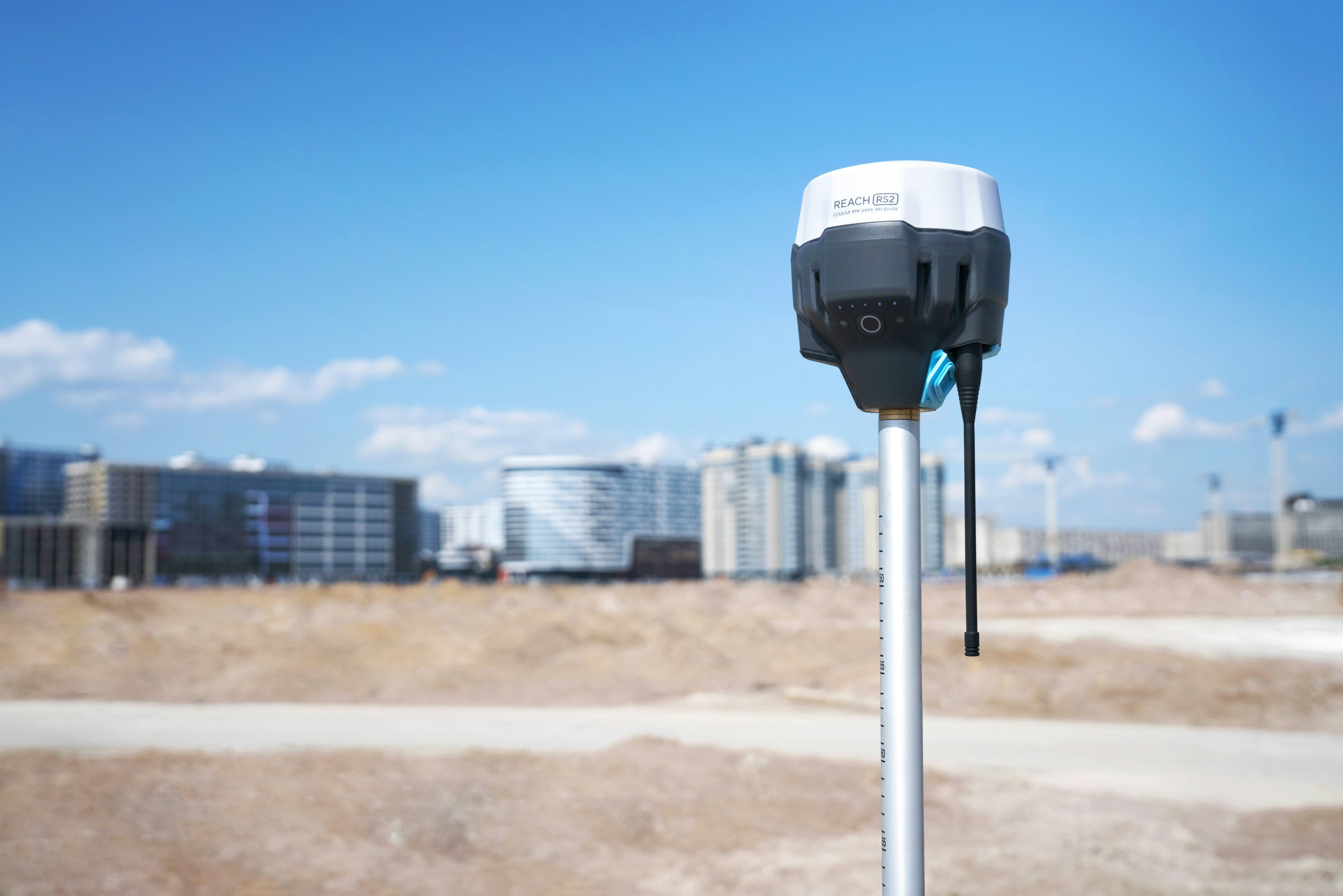 Surveyor pegging boundaries on an East Auckland residential property